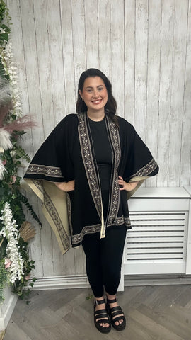 Reversible poncho £22.99