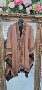 Reversible poncho £22.99